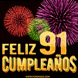 GIF animado con el número 91 en dorado, rodeado de fuegos artificiales rojos, verdes y morados, con el mensaje 'Feliz cumpleaños' en letras doradas.