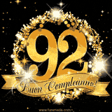 Il numero 92 è circondato da un anello dorato brillante, accompagnato da un nastro elegante con la scritta 'Buon Compleanno!' su uno sfondo scuro.
