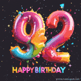 A vibrant age-specific birthday short animation displays the number '92' in shiny balloon-like letters with the words 'Happy Birthday' underneath. The dark background is punctuated with festive stars and balloons.