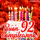 GIF animata per un 92° compleanno, Mostra una torta bianca con candeline colorate accese e coriandoli, di fronte a un muro di rose rosse, Il testo dice 'Buon 92 compleanno!'.