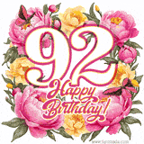 A celebratory GIF image features the animated number '92' and the words 'Happy Birthday!' surrounded by pink and yellow flowers. Two moving butterflies are included in this festive design.