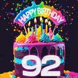 Chocolate cake with cyan layers, pink dressing and a big number 92 adorned with vibrant multicolored frosting, lit candles, and a rainbow topper with text that says 'Happy Birthday'. Animated colorful confetti move behind the cake.
