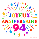 GIF animé joyeux anniversaire 94 ans avec étoiles multicolores et feu d’artifice