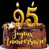GIF animé pour un 95e anniversaire avec une élégante gâteau au chocolat, des bougies dorées formant le chiffre 95 et le texte 'Joyeux Anniversaire!' en écriture dorée.