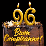 GIF animato con una torta al cioccolato decorata con crema, dettagli dorati e due candele accese che formano il numero 96. Messaggio 'Buon Compleanno' in scritta elegante.