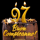 GIF animato con una torta al cioccolato decorata con crema, dettagli dorati e due candele accese che formano il numero 97. Messaggio 'Buon Compleanno' in scritta elegante.