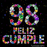 Las palabras FELIZ CUMPLE y el número 98 resaltan al estar hechos de gemas de colores radiantes, ubicadas en un fondo negro con destellos.