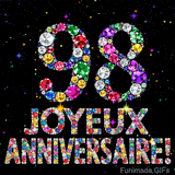 Le chiffre 98 et l'inscription Joyeux Anniversaire dessinés par des joyaux brillants multicolores, entourés de petites étincelles sur fond sombre.