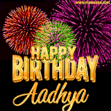 A golden 'Happy Birthday Aadhya' message with vibrant fireworks in the background, creating a festive and celebratory vibe in this animated name GIF.