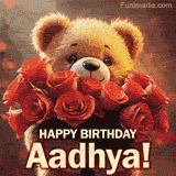 Cinematic style cute animated teddy bear with charming features holding a large bouquet of red roses, the words say 'Happy Birthday Aadhya' in sans serif font.