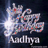 Happy Birthday Aadhya animated GIF featuring a majestic silver crown decorated with rubies and emeralds.