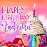 A vibrant birthday GIF featuring a rainbow-colored cupcake topped with white frosting, sprinkles, and a lit candle. The text reads 'Happy Birthday Aadvika' in bold pink and violet letters with white outline.