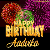 A golden 'Happy Birthday Aadvika' message with vibrant fireworks in the background, creating a festive and celebratory vibe in this animated name GIF.