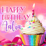 A vibrant birthday GIF featuring a rainbow-colored cupcake topped with white frosting, sprinkles, and a lit candle. The text reads 'Happy Birthday Aalia' in bold pink and violet letters with white outline.