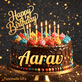 Bright candles flickering on a festive chocolate cake with the name Aarav displayed in golden letters.