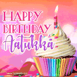 A vibrant birthday GIF featuring a rainbow-colored cupcake topped with white frosting, sprinkles, and a lit candle. The text reads 'Happy Birthday Aatukka' in bold pink and violet letters with white outline.
