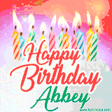Bright birthday candles with rainbow flames on a cake, alongside the text 'Happy Birthday Abbey' in vibrant script in this celebratory animated GIF.