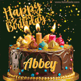 A delightful chocolate birthday cake with bright candles and 'Happy Birthday Abbey' written in gold amidst a shower of animated stars.