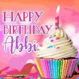 A vibrant birthday GIF featuring a rainbow-colored cupcake topped with white frosting, sprinkles, and a lit candle. The text reads 'Happy Birthday Abbi' in bold pink and violet letters with white outline.