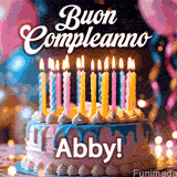 Birthday cake topped with pink and yellow lit candles, surrounded by glowing bokeh lights and party balloons. The greeting 'Buon Compleanno Abby GIF!' is displayed.
