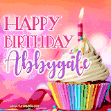 A vibrant birthday GIF featuring a rainbow-colored cupcake topped with white frosting, sprinkles, and a lit candle. The text reads 'Happy Birthday Abbygale' in bold pink and violet letters with white outline.