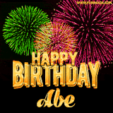 A captivating GIF with bursts of green, pink, and orange fireworks lighting up the night sky, accompanied by 'Happy Birthday Abe' in glowing golden text.