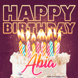 A colorful birthday cake topped with lit candles, with the words 'Happy Birthday Abia' in bold glowing letters on a burgundy background. Animated flames add a festive touch.
