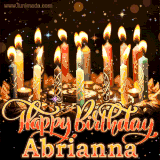 A glowing personalized birthday GIF with name Abrianna featuring lit candles with intricate designs, warm lighting, and the text 'Happy Birthday' in an elegant font.