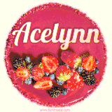 Beautifully decorated red velvet berry birthday cake with vibrant fruits and a glowing 'Acelynn' name, adding a touch of sweetness and sparkle.