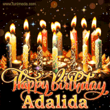 A glowing personalized birthday GIF with name Adalida featuring lit candles with intricate designs, warm lighting, and the text 'Happy Birthday' in an elegant font.