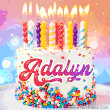 A cheerful white birthday cake with multicolor sprinkles, lit candles, and 'Adalyn' written in vibrant letters, in an animated GIF.