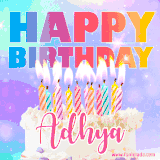 A vibrant animated name GIF with the words 'Happy Birthday Adhya' with colorful candles on a creamy cake. The background sparkles with pastel shades, adding a festive touch.