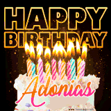 A vibrant animated GIF featuring a delicious birthday cake topped with glowing candles and the name 'Adonias' in elegant script, and the words 'Happy Birthday' on the black background.