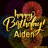 A vibrant display of multicolor fireworks with the text 'Happy Birthday Aiden' written in gold, glowing beautifully in front of the explosive background.