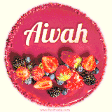 Beautifully decorated red velvet berry birthday cake with vibrant fruits and a glowing 'Aivah' name, adding a touch of sweetness and sparkle.
