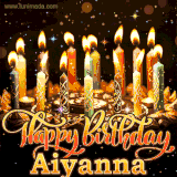 A glowing personalized birthday GIF with name Aiyanna featuring lit candles with intricate designs, warm lighting, and the text 'Happy Birthday' in an elegant font.