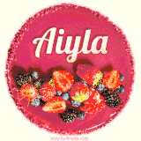 Beautifully decorated red velvet berry birthday cake with vibrant fruits and a glowing 'Aiyla' name, adding a touch of sweetness and sparkle.
