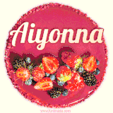 Beautifully decorated red velvet berry birthday cake with vibrant fruits and a glowing 'Aiyonna' name, adding a touch of sweetness and sparkle.