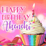 A vibrant birthday GIF featuring a rainbow-colored cupcake topped with white frosting, sprinkles, and a lit candle. The text reads 'Happy Birthday Akeneki' in bold pink and violet letters with white outline.