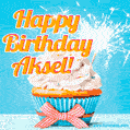 A cheerful animated GIF of a cupcake with creamy frosting, a red checkered ribbon, and a bright sparkler on top. The text 'Happy Birthday Aksel!' is displayed in vibrant orange and red.