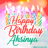 Bright birthday candles with rainbow flames on a cake, alongside the text 'Happy Birthday Aksinya' in vibrant script in this celebratory animated GIF.