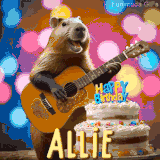 Animated birthday GIF showing a capybara playing guitar and singing beside a birthday cake with the name Allie in large letters and colorful bokeh lights in the background.