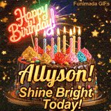 Close-up of multicolored frosting swirls and colorful candy beads around the gold base of Allyson's birthday cake.