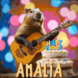 Animated birthday GIF showing a capybara playing guitar and singing beside a birthday cake with the name Amalia in large letters and colorful bokeh lights in the background.