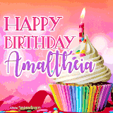 A vibrant birthday GIF featuring a rainbow-colored cupcake topped with white frosting, sprinkles, and a lit candle. The text reads 'Happy Birthday Amaltheia' in bold pink and violet letters with white outline.