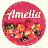 Beautifully decorated red velvet berry birthday cake with vibrant fruits and a glowing 'Ameila' name, adding a touch of sweetness and sparkle.
