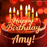 Beautifully decorated red velvet berry birthday cake with vibrant fruits and a glowing 'Amy' name, adding a touch of sweetness and sparkle.