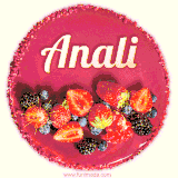 Beautifully decorated red velvet berry birthday cake with vibrant fruits and a glowing 'Anali' name, adding a touch of sweetness and sparkle.