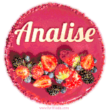 Beautifully decorated red velvet berry birthday cake with vibrant fruits and a glowing 'Analise' name, adding a touch of sweetness and sparkle.