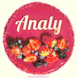 Beautifully decorated red velvet berry birthday cake with vibrant fruits and a glowing 'Analy' name, adding a touch of sweetness and sparkle.